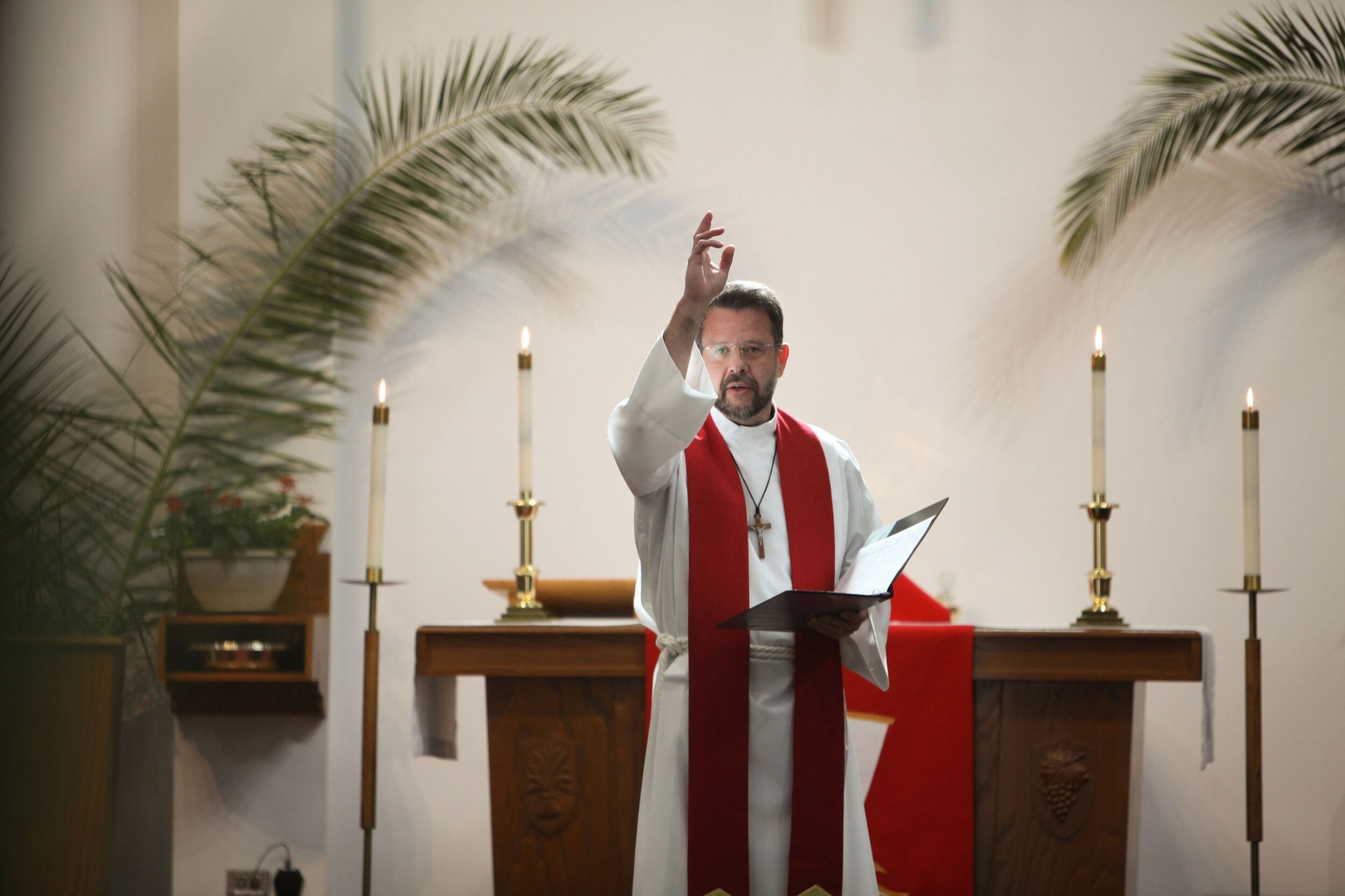 Pastor leading worship